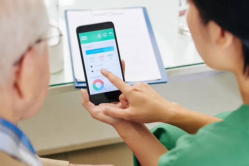 nurse-showing-patient-phone